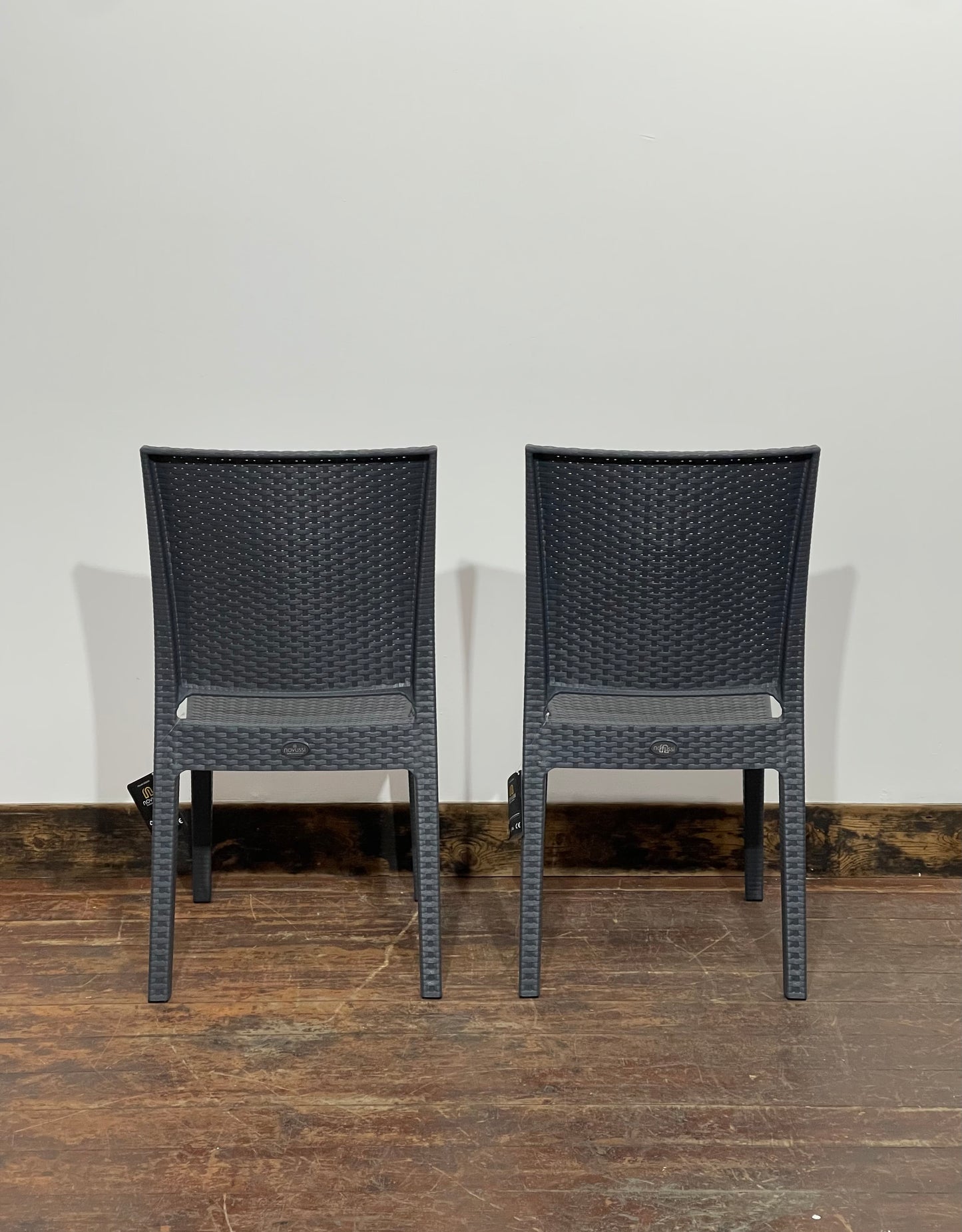 Pair of stackable outdoor pub / bar / cafe chairs in grey (no armrests)