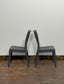 Pair of stackable outdoor pub / bar / cafe chairs in grey (no armrests)