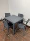 Pair of stackable outdoor pub / bar / cafe chairs in grey (no armrests)