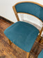 Set of 5 matching dining chairs in light wood with teal / light blue fabric