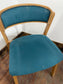 Set of 5 matching dining chairs in light wood with teal / light blue fabric