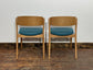 Set of 5 matching dining chairs in light wood with teal / light blue fabric