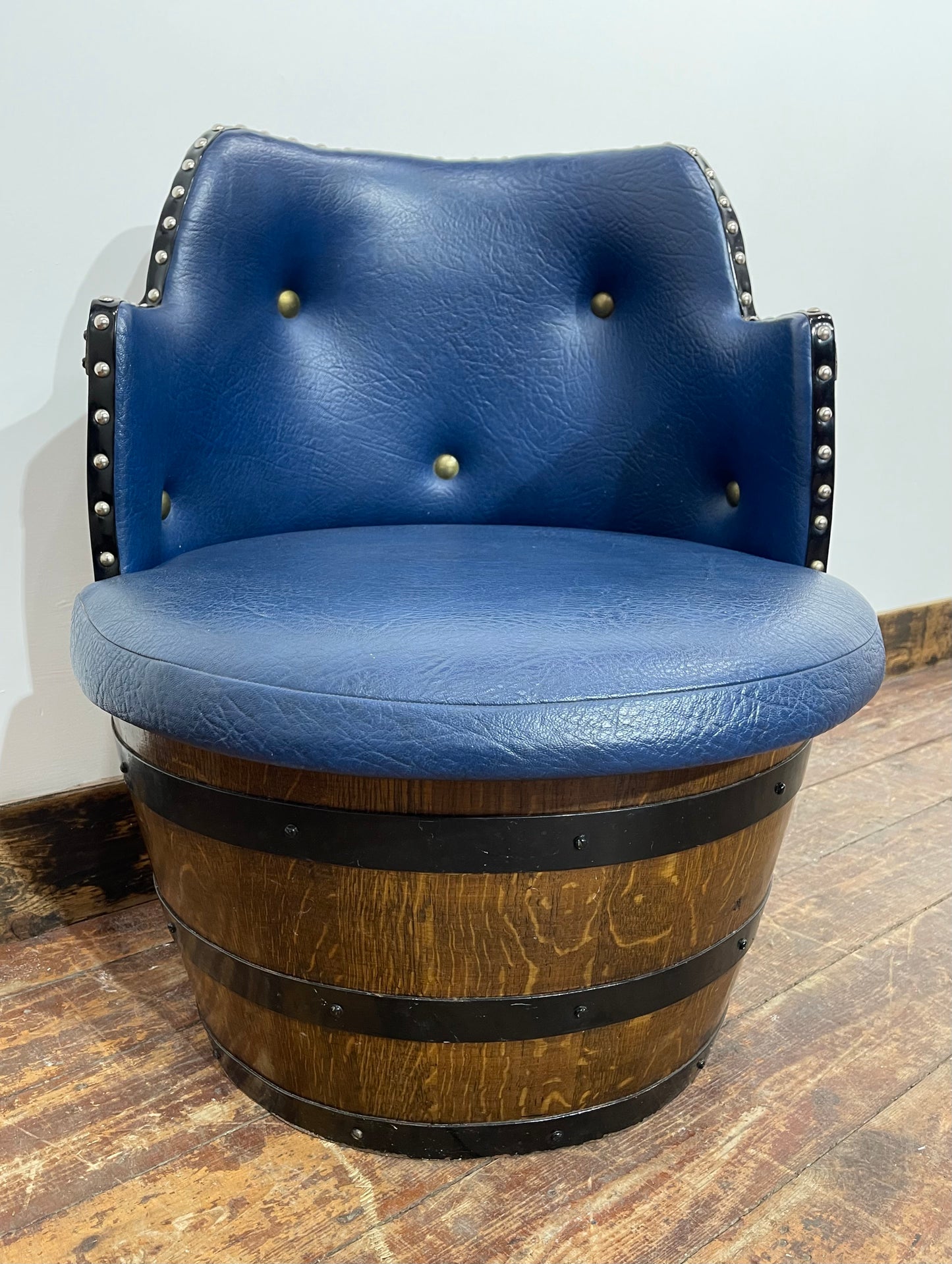 Vintage / retro pub seat in blue leather made from whisky barrel