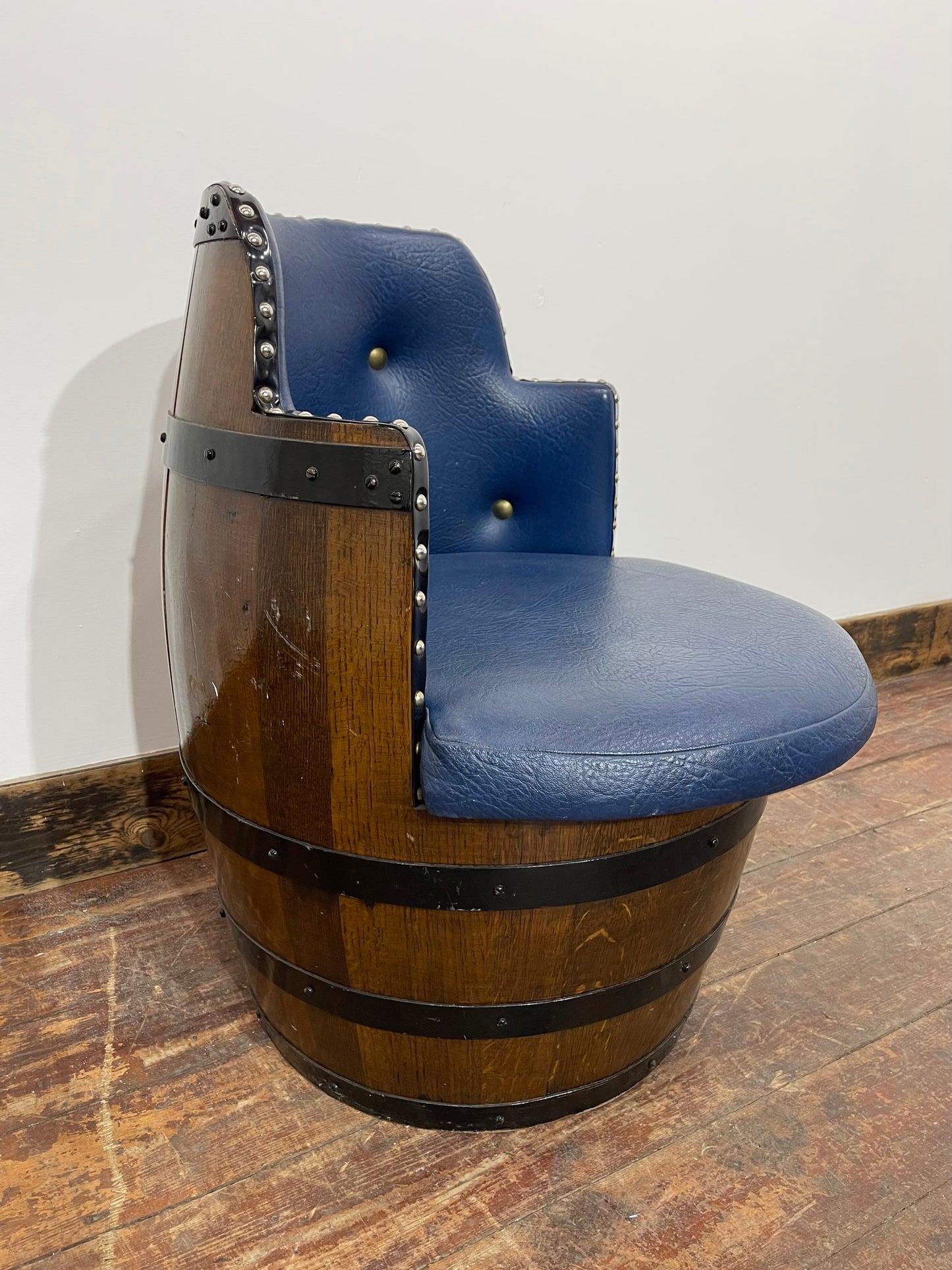 Vintage / retro pub seat in blue leather made from whisky barrel