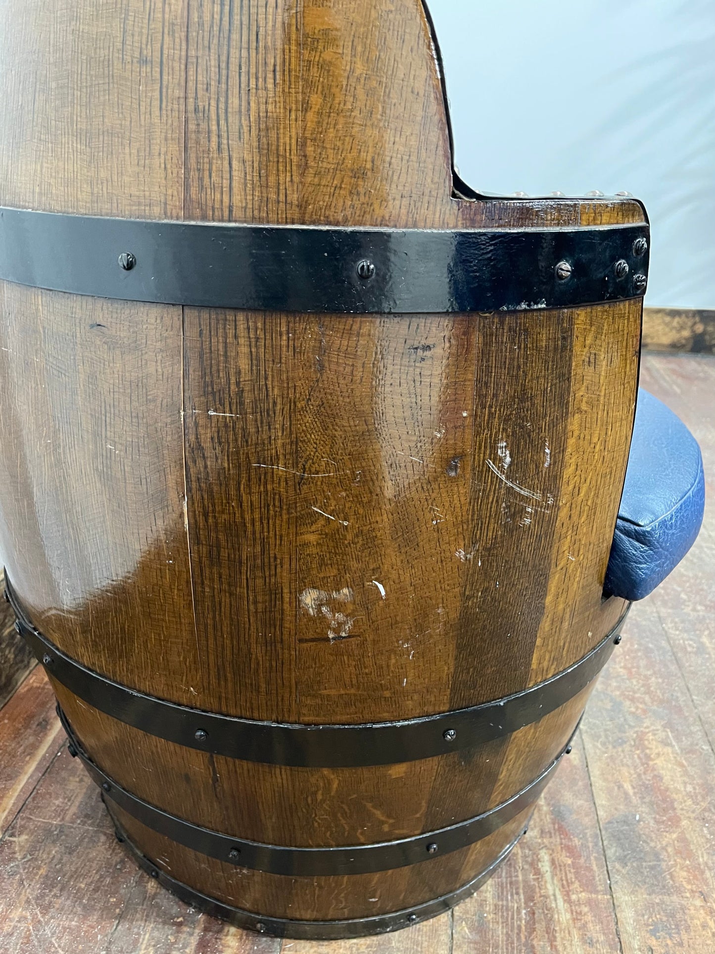 Vintage / retro pub seat in blue leather made from whisky barrel