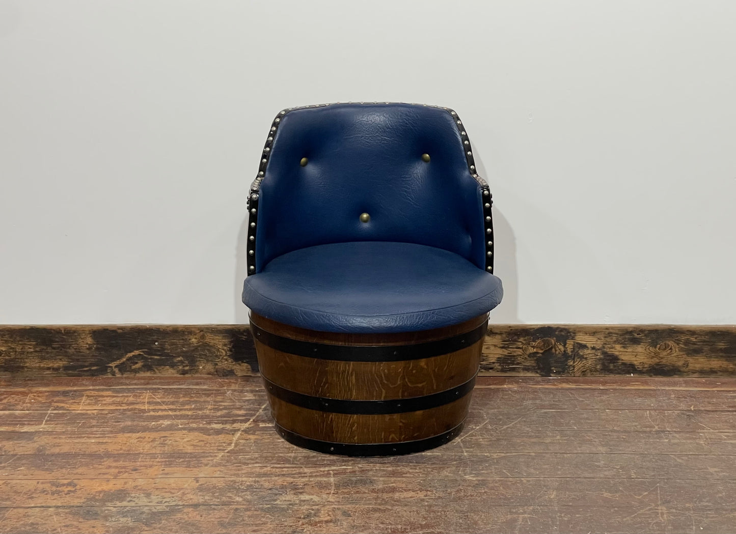 Vintage / retro pub seat in blue leather made from whisky barrel