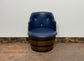 Vintage / retro pub seat in blue leather made from whisky barrel