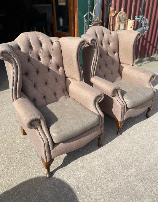 Pair of matching wingback armchairs in light brown / beige fabric