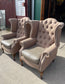 Pair of matching wingback armchairs in light brown / beige fabric