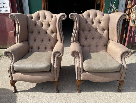 Pair of matching wingback armchairs in light brown / beige fabric
