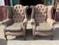 Pair of matching wingback armchairs in light brown / beige fabric