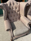 Pair of matching wingback armchairs in light brown / beige fabric