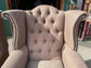 Pair of matching wingback armchairs in light brown / beige fabric