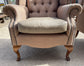 Pair of matching wingback armchairs in light brown / beige fabric
