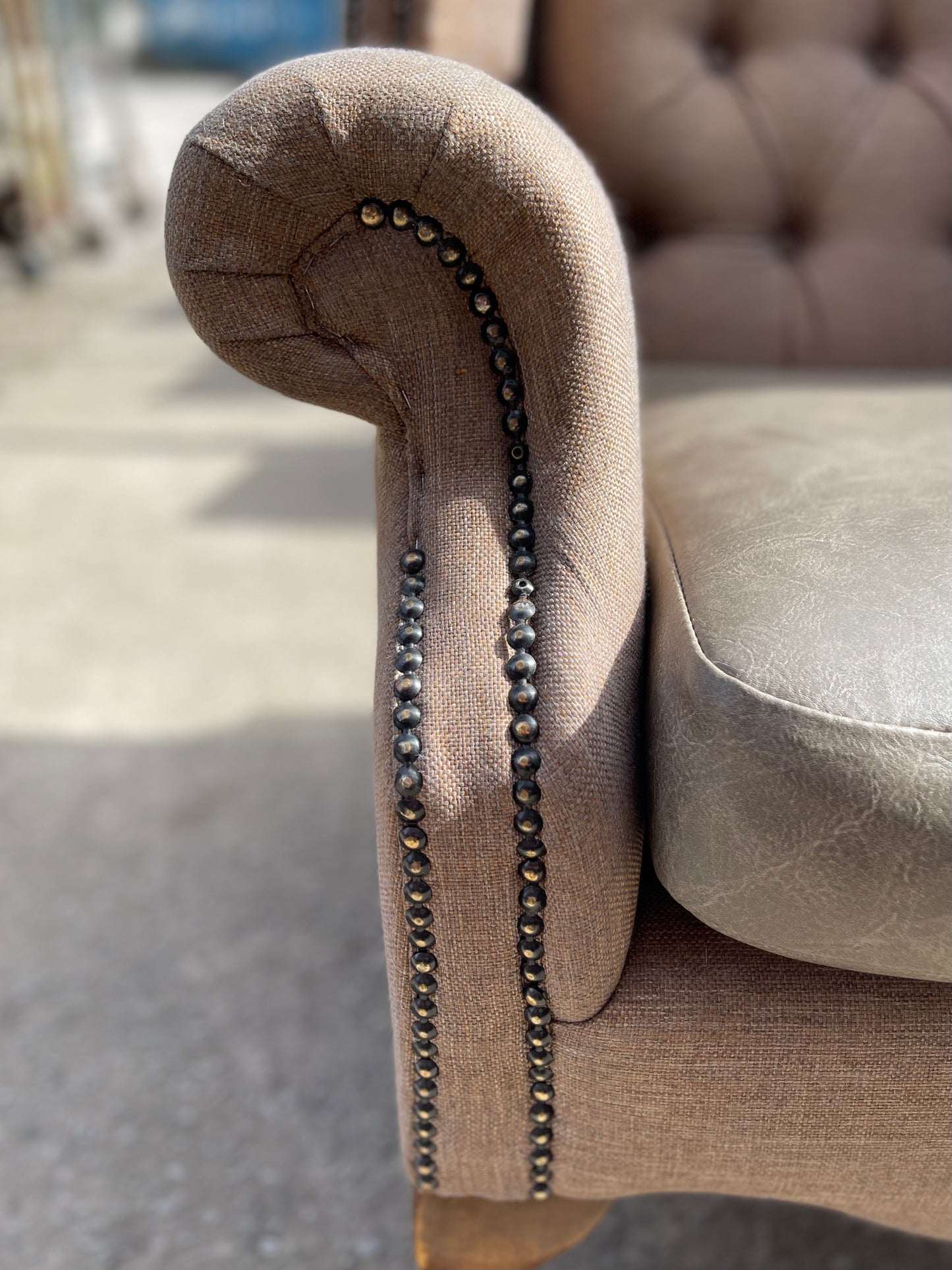 Pair of matching wingback armchairs in light brown / beige fabric