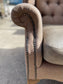 Pair of matching wingback armchairs in light brown / beige fabric