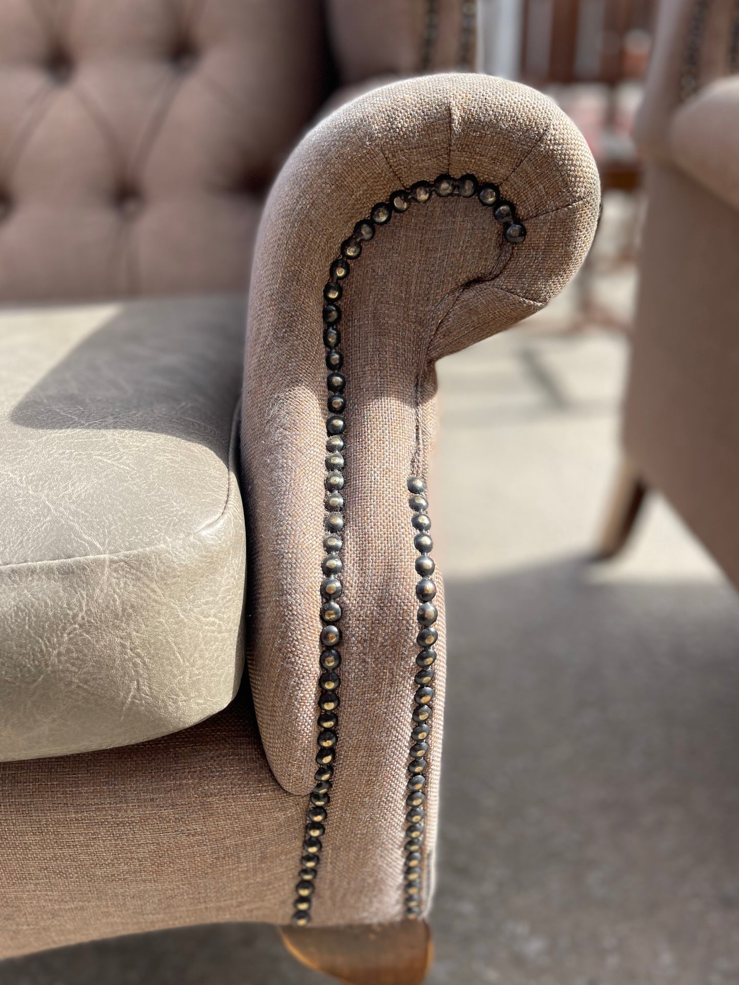 Pair of matching wingback armchairs in light brown / beige fabric