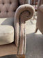 Pair of matching wingback armchairs in light brown / beige fabric