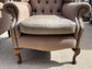 Pair of matching wingback armchairs in light brown / beige fabric
