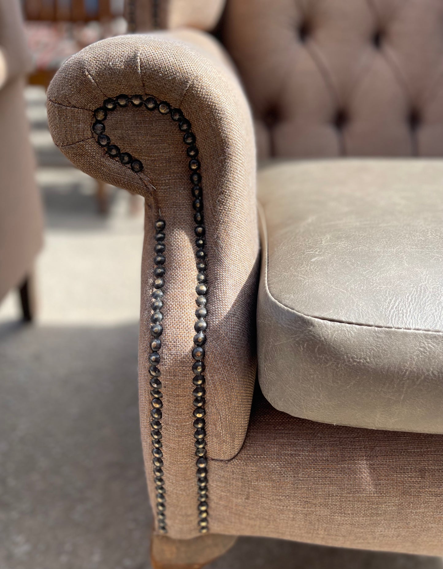 Pair of matching wingback armchairs in light brown / beige fabric