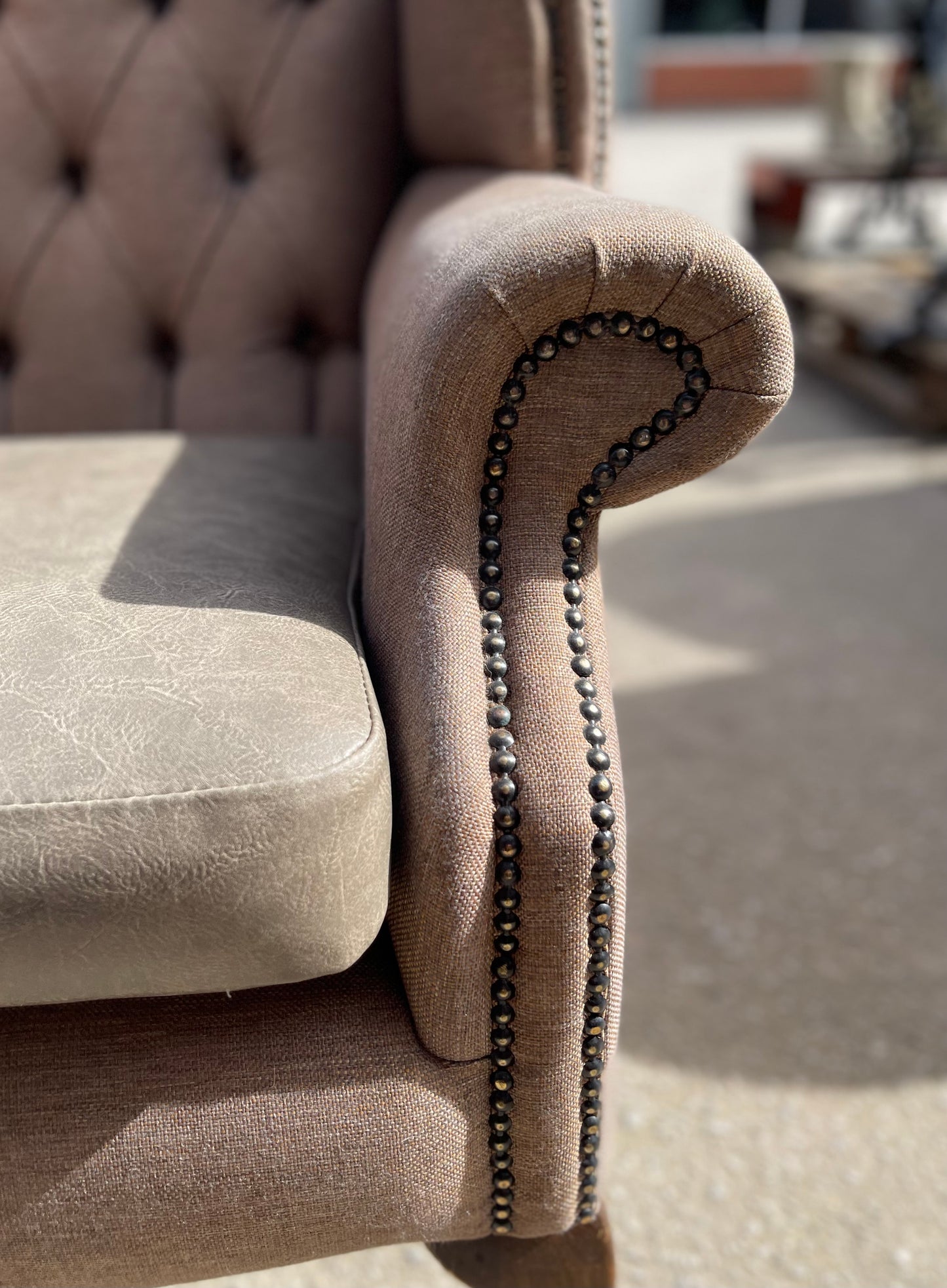 Pair of matching wingback armchairs in light brown / beige fabric