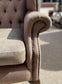 Pair of matching wingback armchairs in light brown / beige fabric