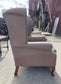 Pair of matching wingback armchairs in light brown / beige fabric