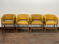 Matching set of 4 yellow tub chairs in faux-leather