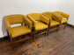 Matching set of 4 yellow tub chairs in faux-leather