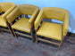 Matching set of 4 yellow tub chairs in faux-leather