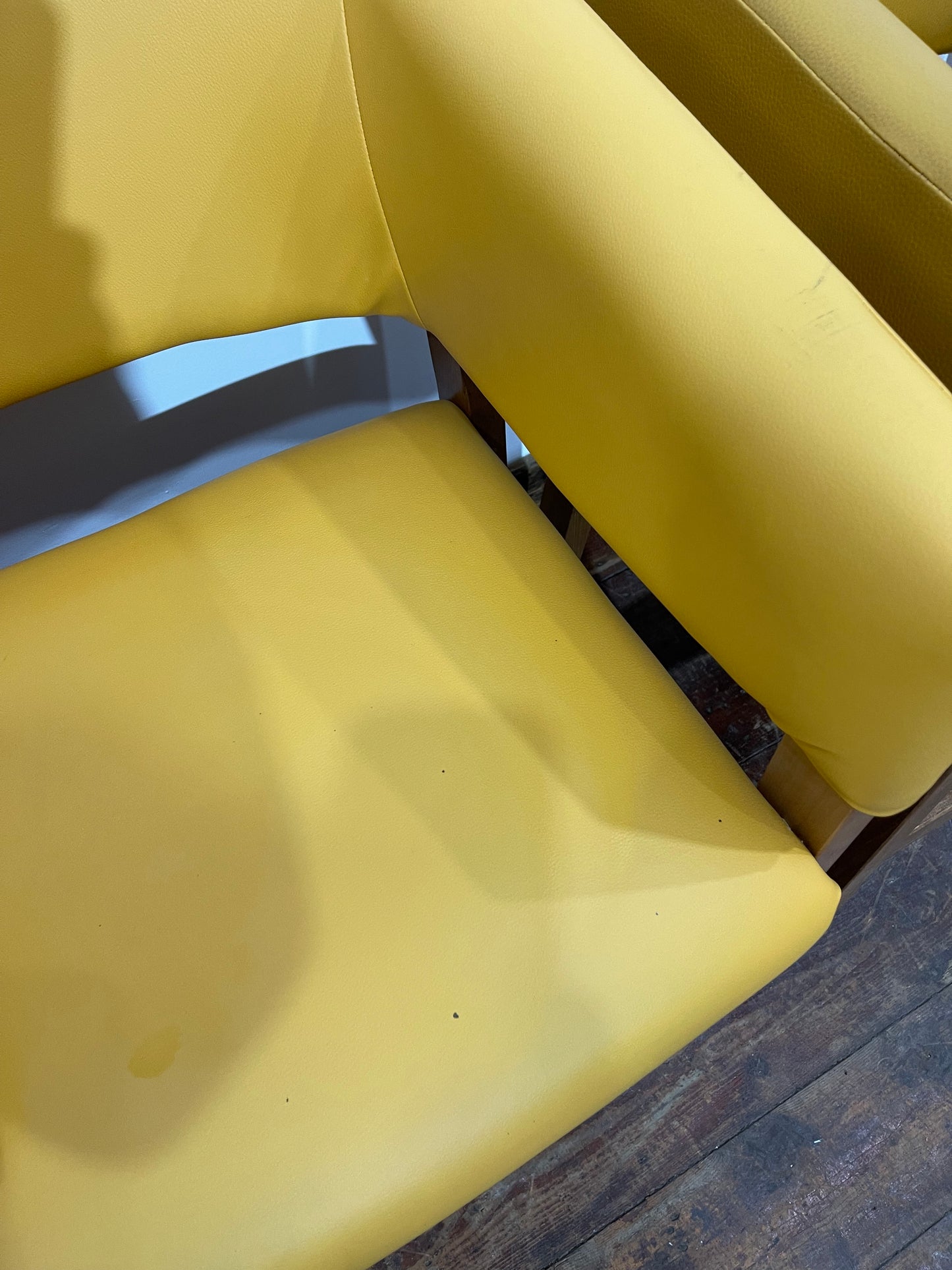 Matching set of 4 yellow tub chairs in faux-leather