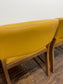 Matching set of 4 yellow tub chairs in faux-leather
