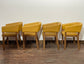 Matching set of 4 yellow tub chairs in faux-leather