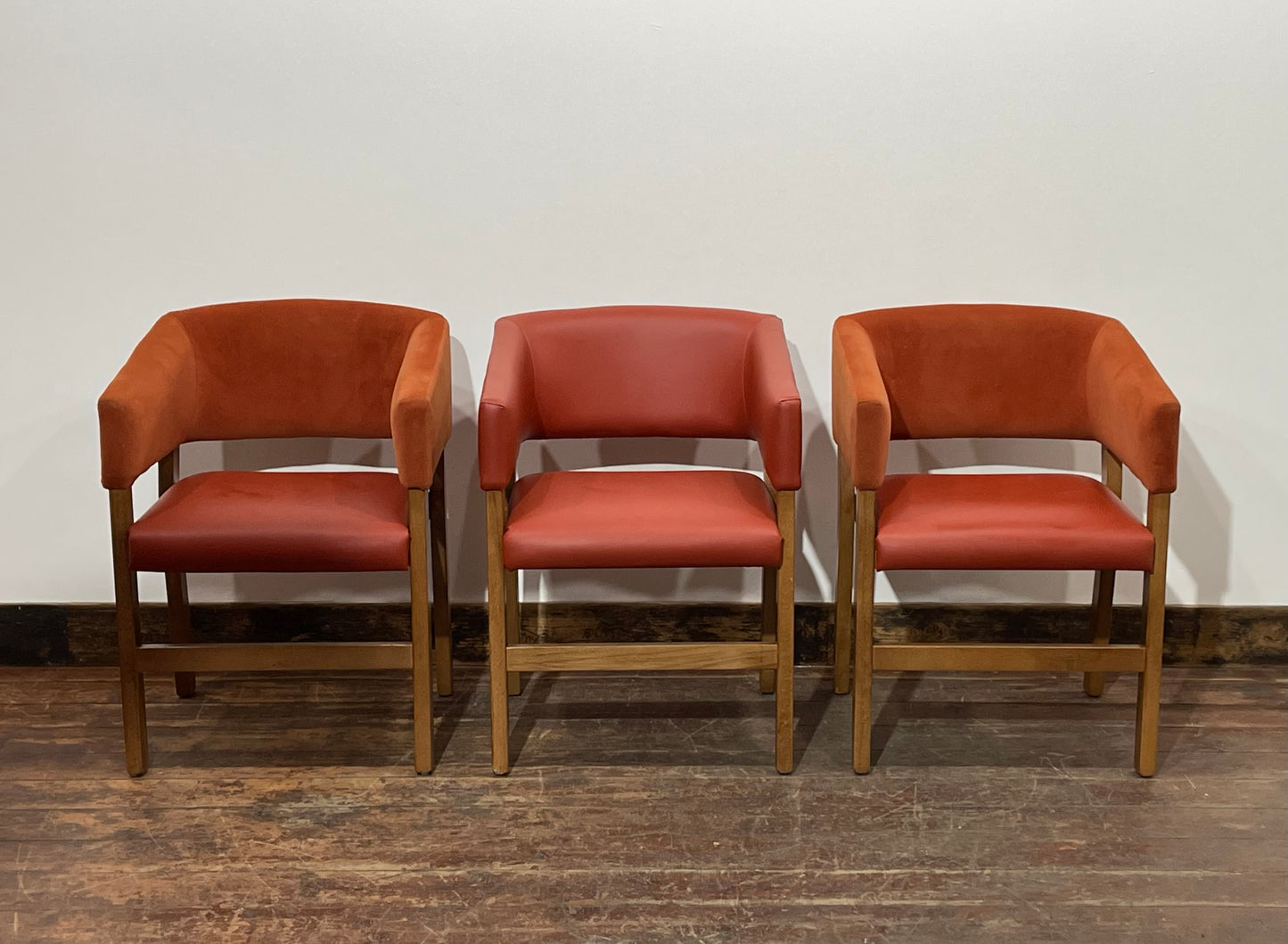 Matching set of 3 red - orange tub chairs in faux-leather