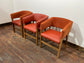 Matching set of 3 red - orange tub chairs in faux-leather