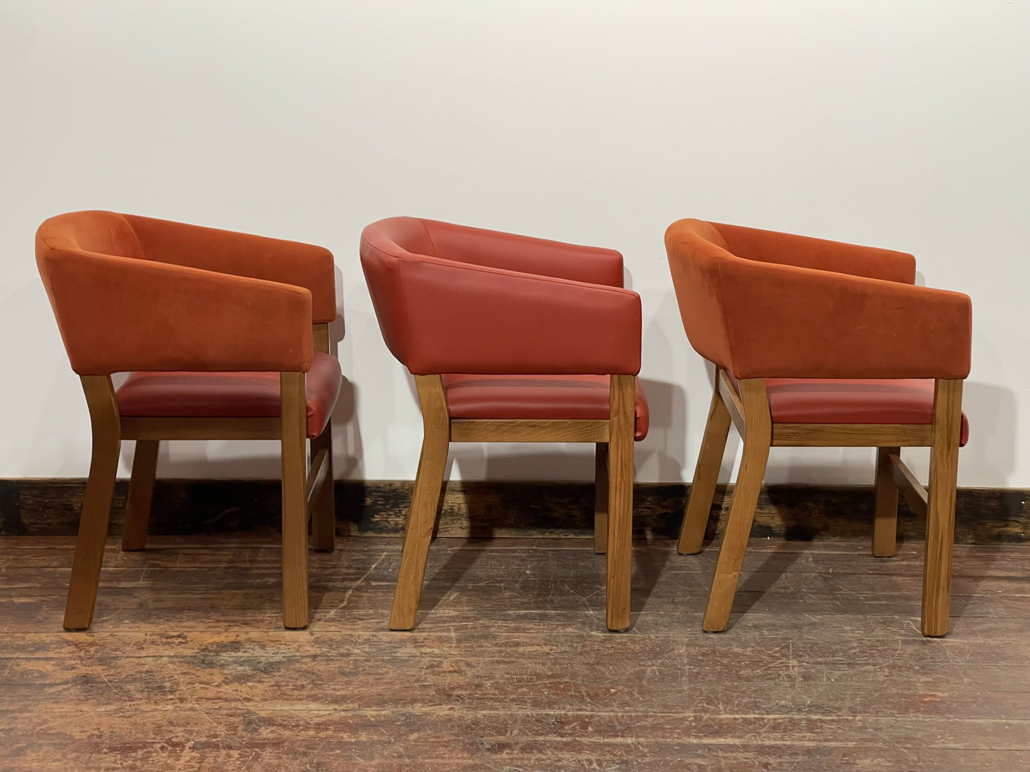 Matching set of 3 red - orange tub chairs in faux-leather