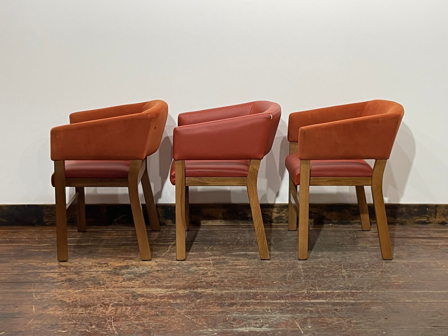 Matching set of 3 red - orange tub chairs in faux-leather