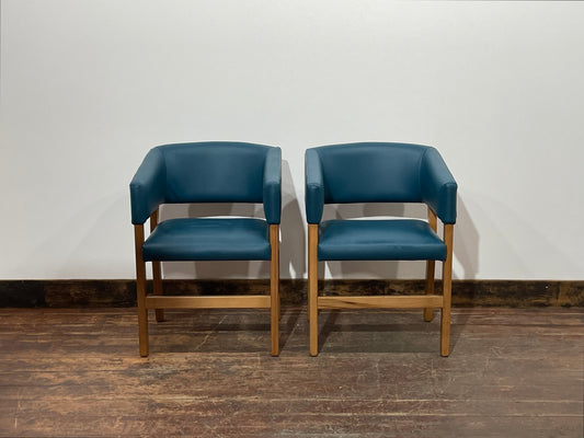 Matching set of 2 tub chairs in blue faux-leather