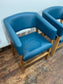 Matching set of 2 tub chairs in blue faux-leather