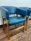 Matching set of 2 tub chairs in blue faux-leather