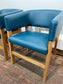 Matching set of 2 tub chairs in blue faux-leather