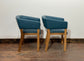 Matching set of 2 tub chairs in blue faux-leather