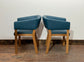 Matching set of 2 tub chairs in blue faux-leather