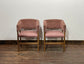 Matching set of 2 pale pink tub chairs in faux-leather