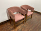 Matching set of 2 pale pink tub chairs in faux-leather