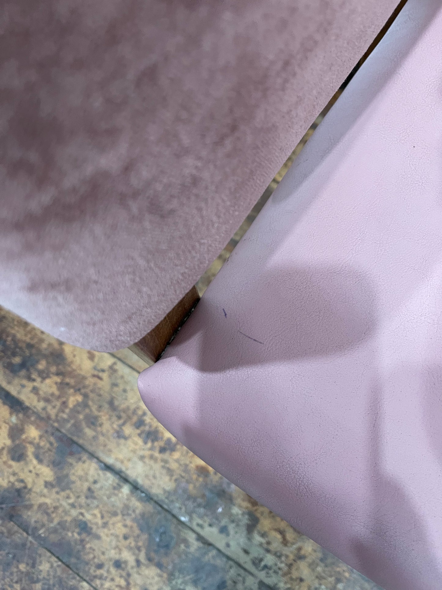 Matching set of 2 pale pink tub chairs in faux-leather