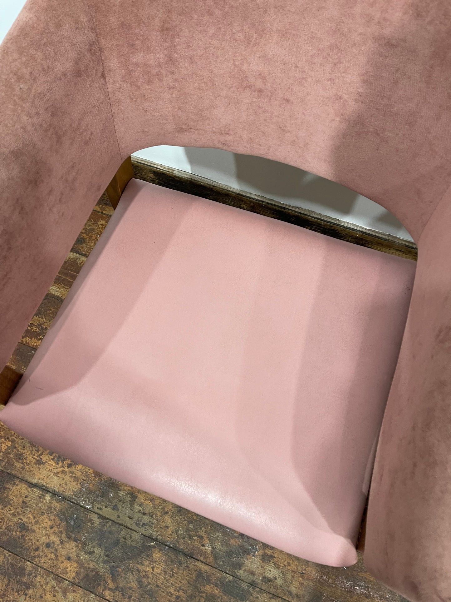 Matching set of 2 pale pink tub chairs in faux-leather