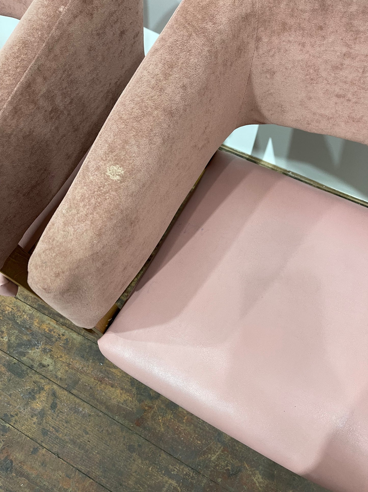 Matching set of 2 pale pink tub chairs in faux-leather