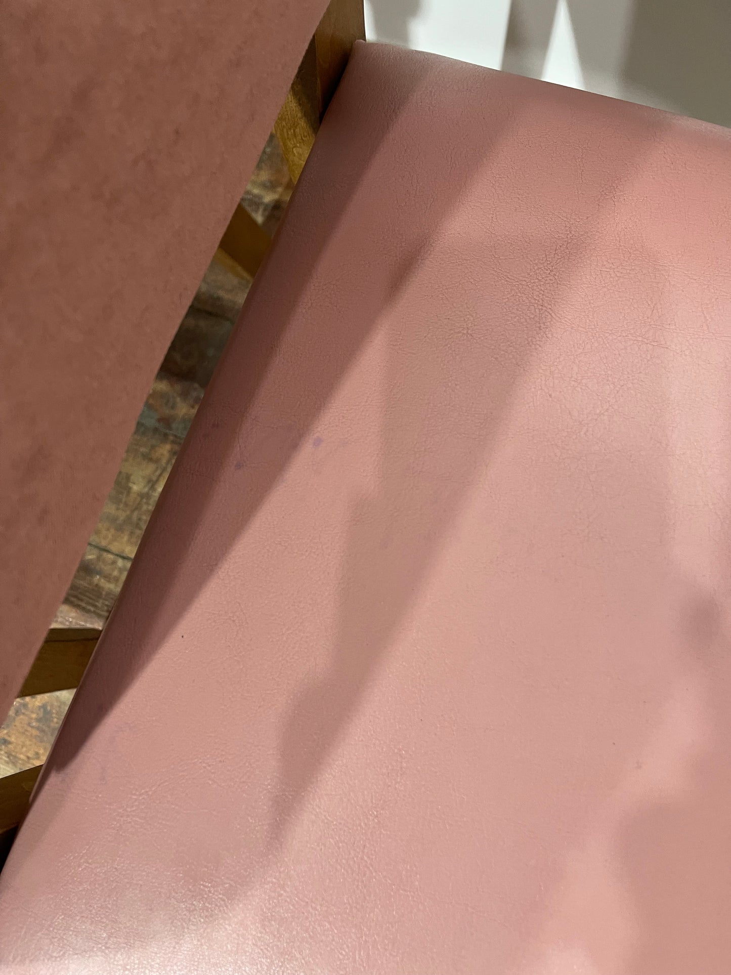 Matching set of 2 pale pink tub chairs in faux-leather