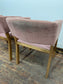 Matching set of 2 pale pink tub chairs in faux-leather